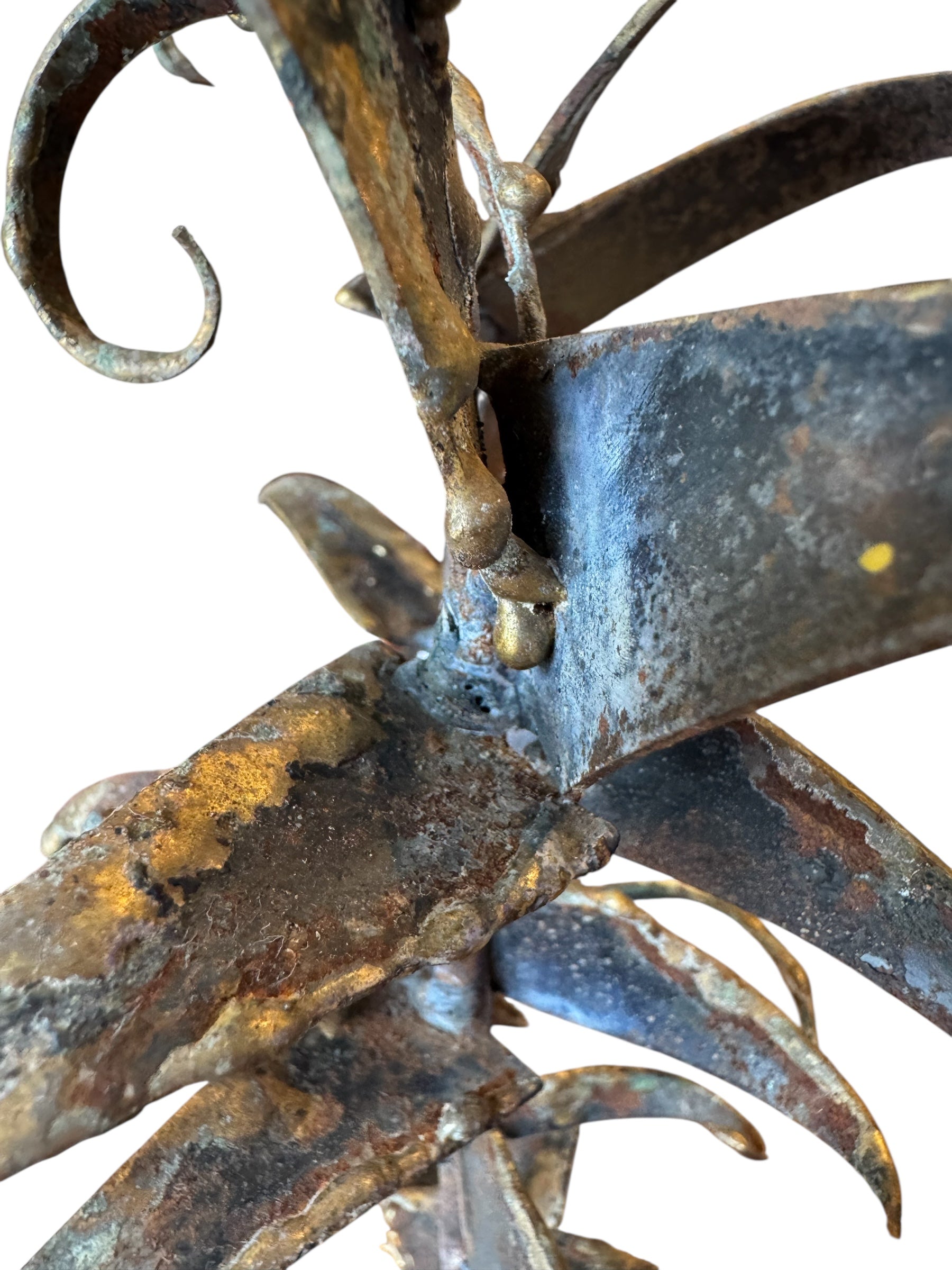 Mid-century Brutalist sculpture made of brass and bronze, depicting a stylized plant with textured, oxidized surfaces.