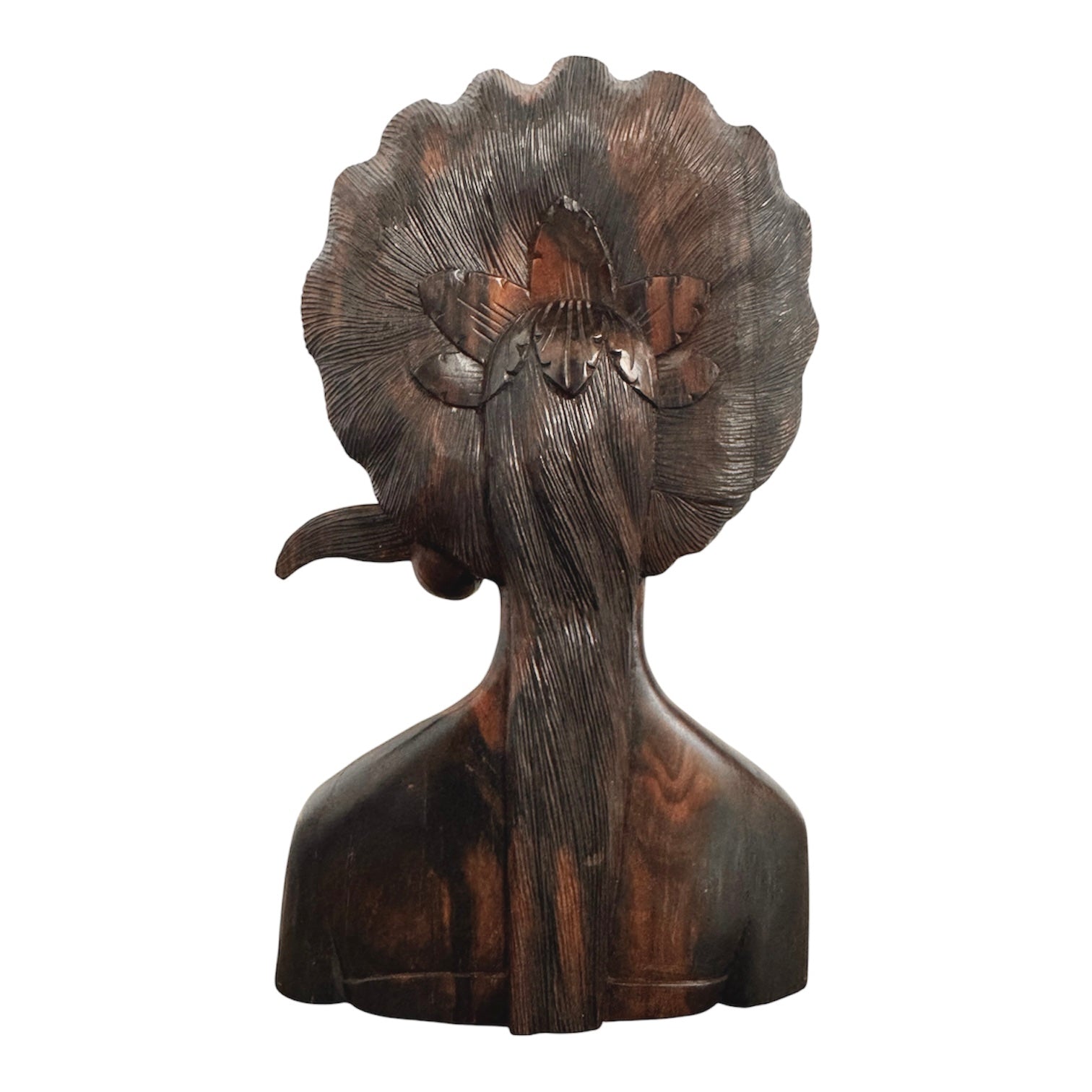An elegant hand-carved bust of a woman made from rich, polished dark ebony wood with striking reddish-brown grain patterns running vertically through her face and chest. The sculpture features a serene expression with closed eyes, a slender nose, and relaxed lips. Her voluminous, textured hair rises upward in a Fan-like shape, intricately carved with fine lines and adorned with small, delicate flower details. The bust includes her bare shoulders and upper chest, resting on a flat base.