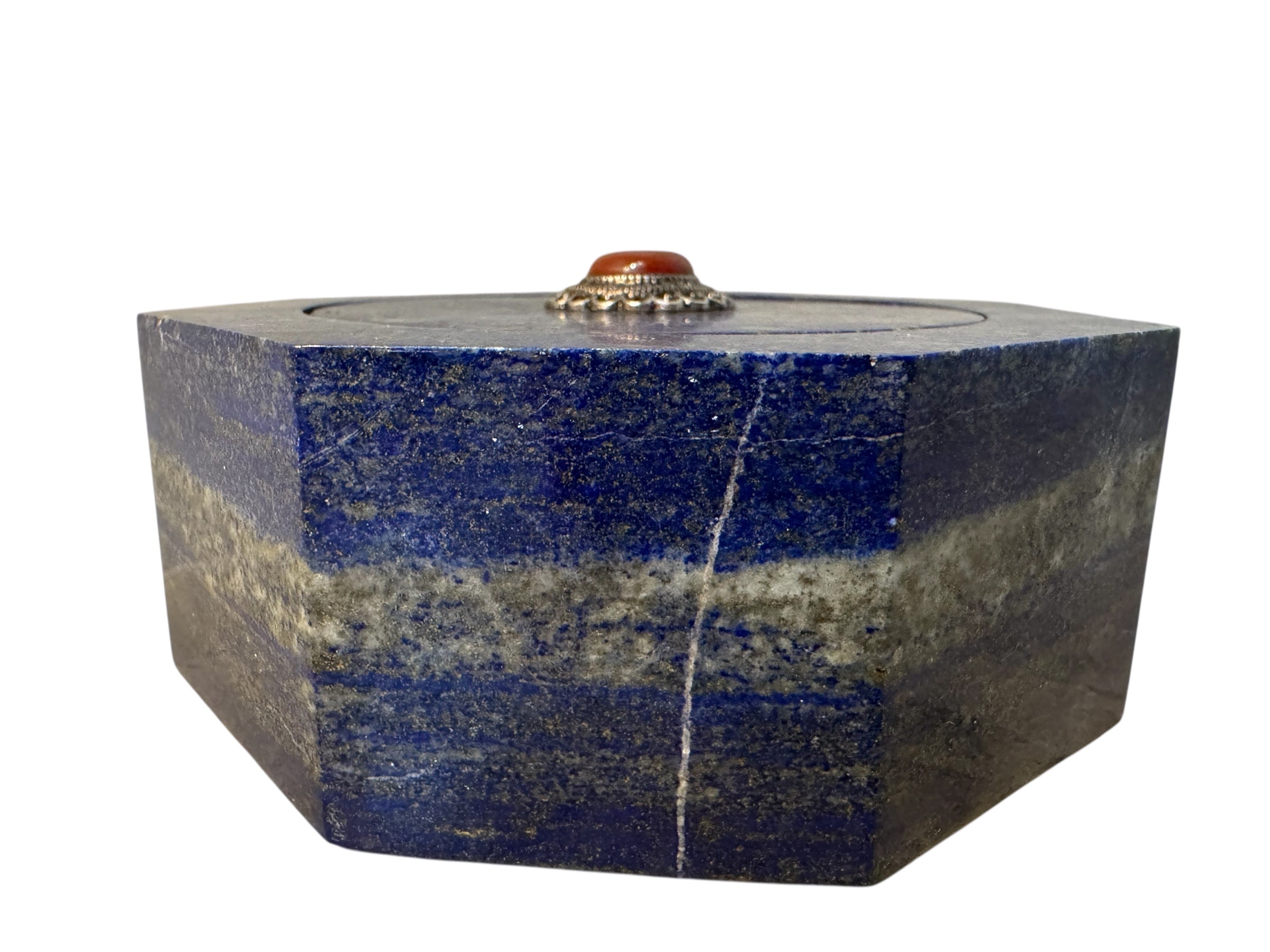 Hand-carved octagonal box made of lapis lazuli, featuring a red cabochon stone on its lid.