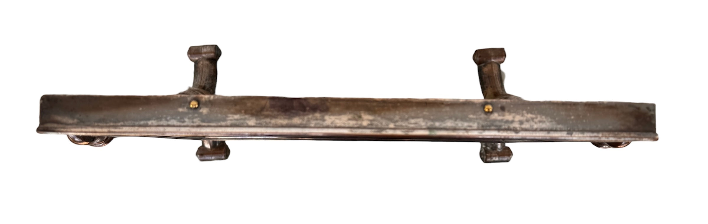 The antique Chevalier Mirror features a rectangular swing frame supported by two turned posts on decorative trestle feet. The mirror stands on four scrolled feet and features its original tarnished, silvered finish. The front of the mirror reflects a bright blue sky with wispy white clouds. The original dark brown backing is still attached to the frame.
