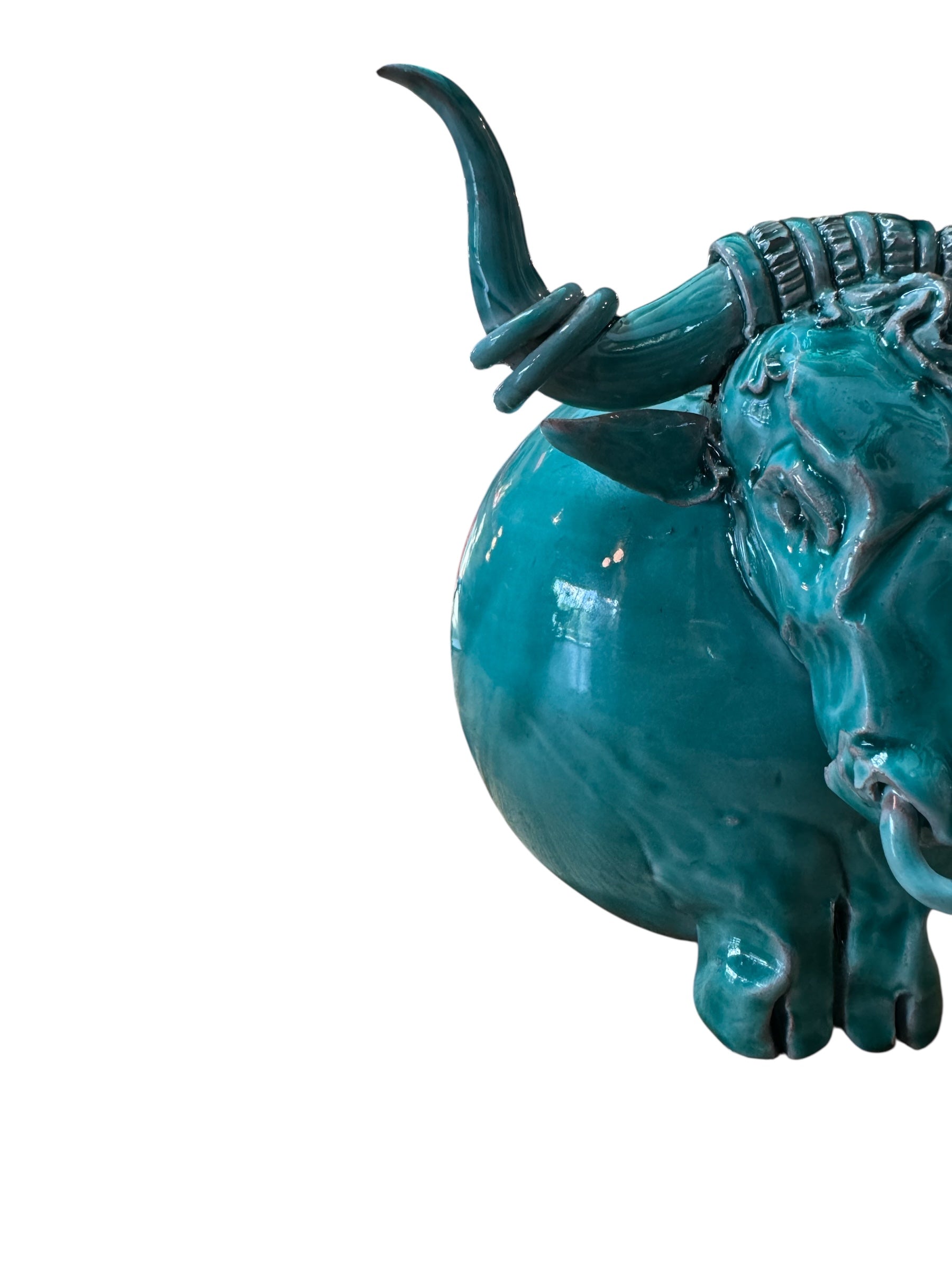 Glossy turquoise ceramic Ankole-Watusi sculpture with long, stylized horns and a nose ring.