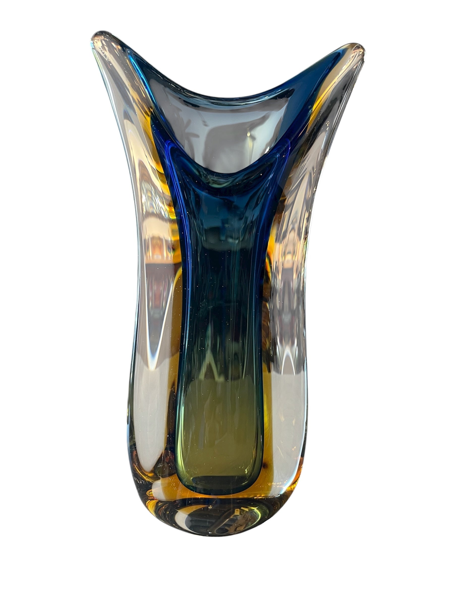 Sculptural art glass vase in the Sommerso style, featuring blue and amber colors encased in a clear glass layer. The vase has a vintage mid-century modern design