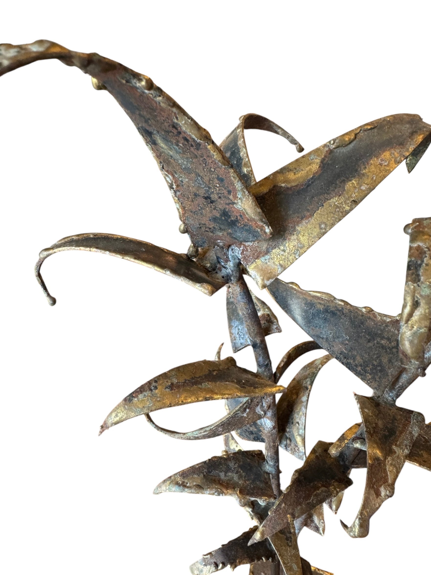 Mid-century Brutalist sculpture made of brass and bronze, depicting a stylized plant with textured, oxidized surfaces.