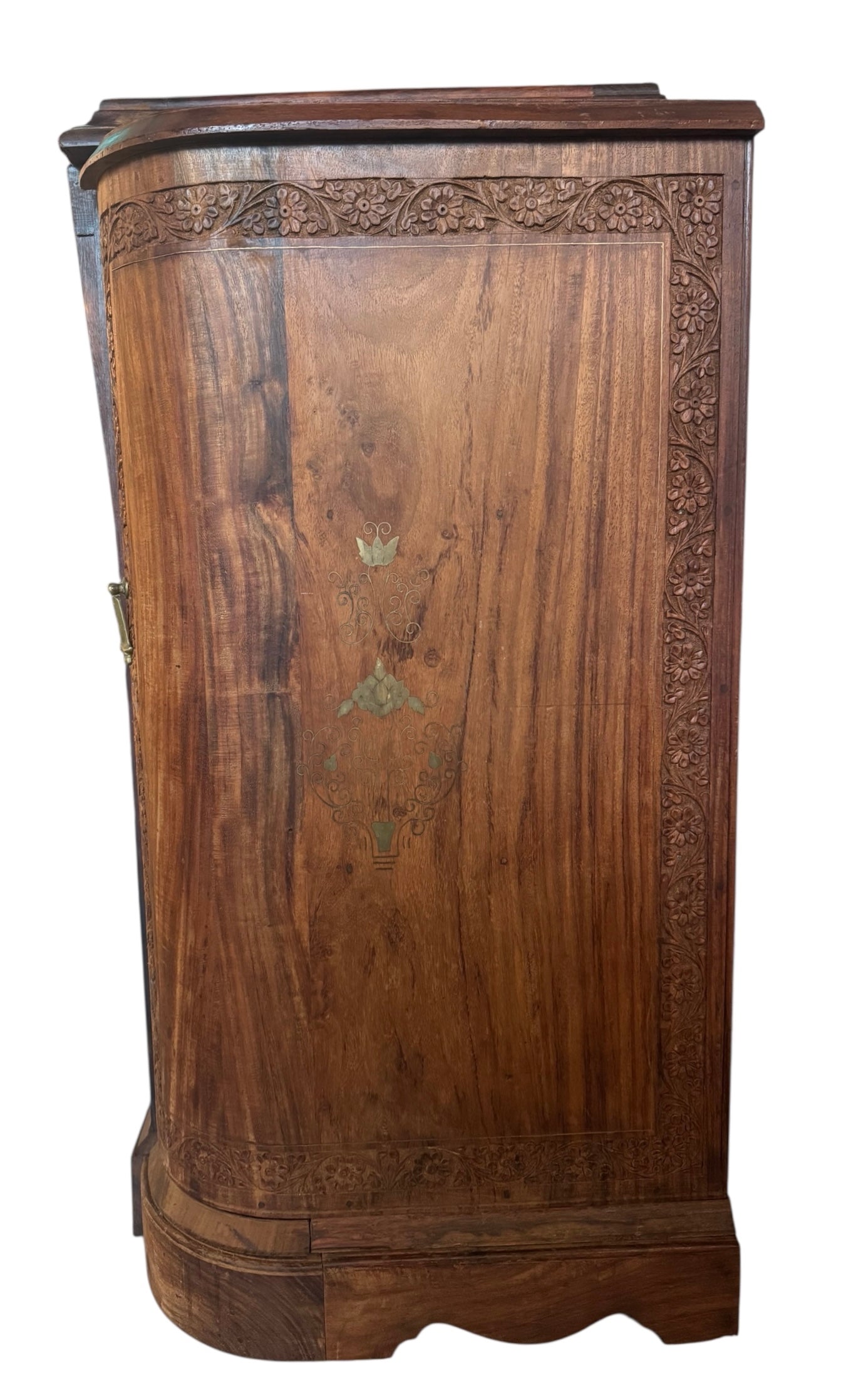 Antique bar cabinet with wood inlay and brass floral details, open to reveal interior shelving and bar storage