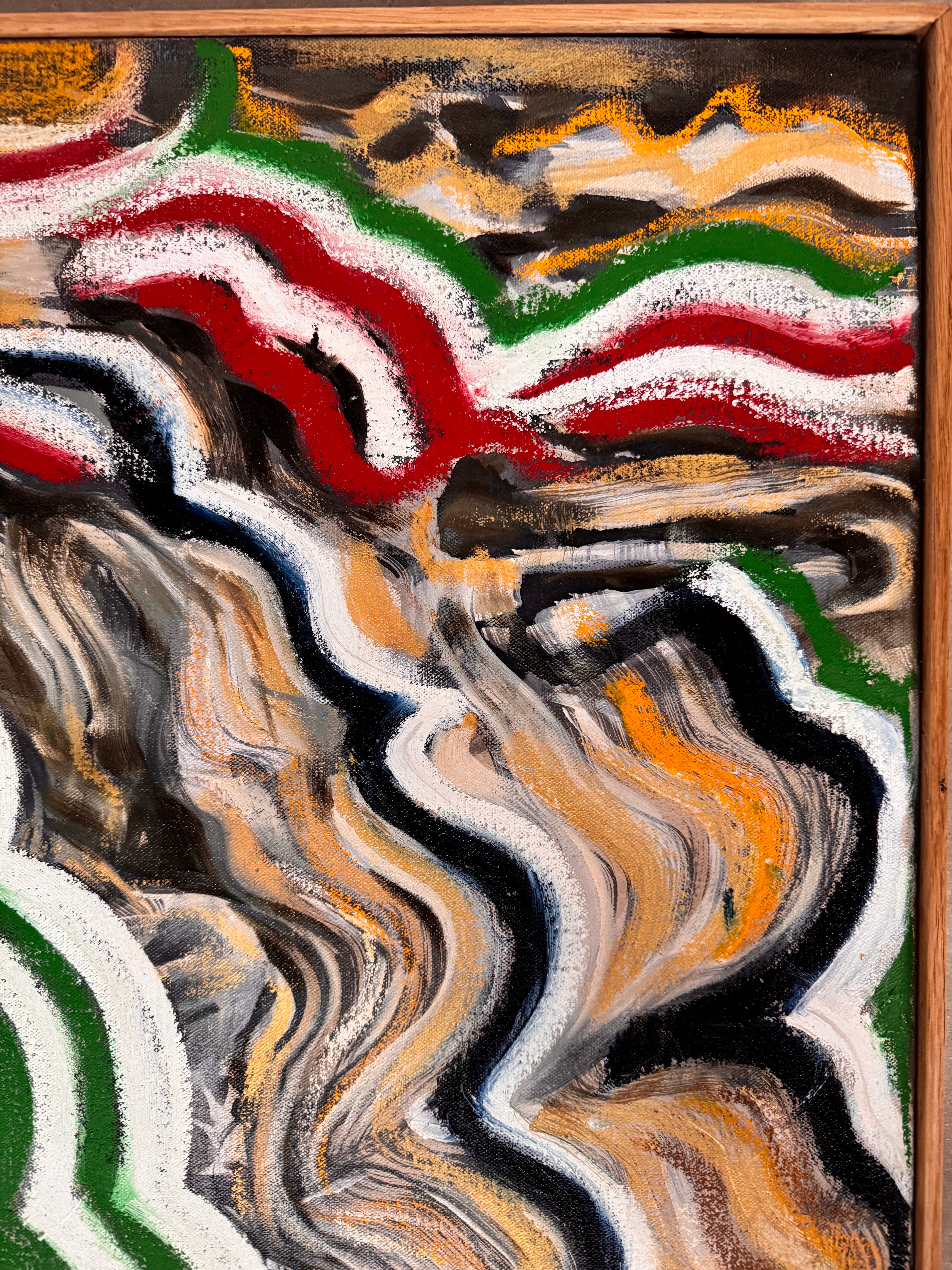 A close-up, angled view of an abstract oil painting titled 'Topography' by Robert Wymer. The painting's edge reveals thick, textured swirls of brown, gold, red, green, and white paint. It is framed in a natural light-brown teak wood frame, with a visible corner joint where two pieces of wood meet