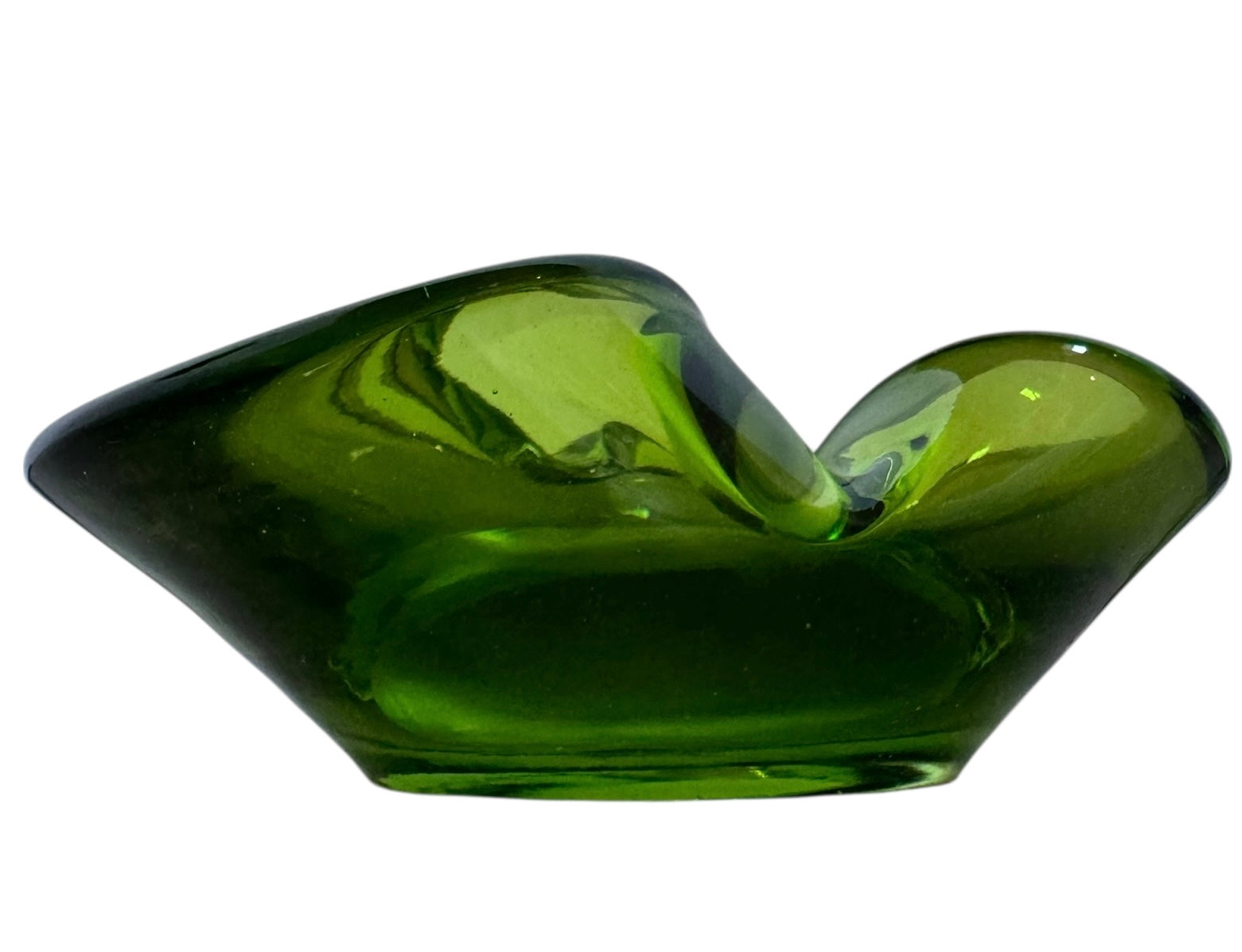 A vintage, Mid-Century Modern, peridot green art glass ashtray or catchall bowl with a curved, free-form design.