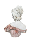 A 25-inch high polychrome marble bust of a woman, featuring white marble for her face and hair, with a base and draped fabric adorned with carved roses and leaves.