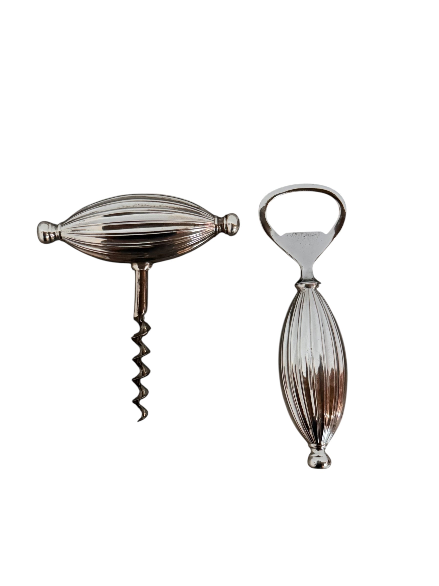 A silver corkscrew and a matching silver bottle opener, both featuring fluted, oval-shaped handles. The set is identified as a Spanish Silver (925) bar/cocktail set by Pedro Duran Morales, circa 1950