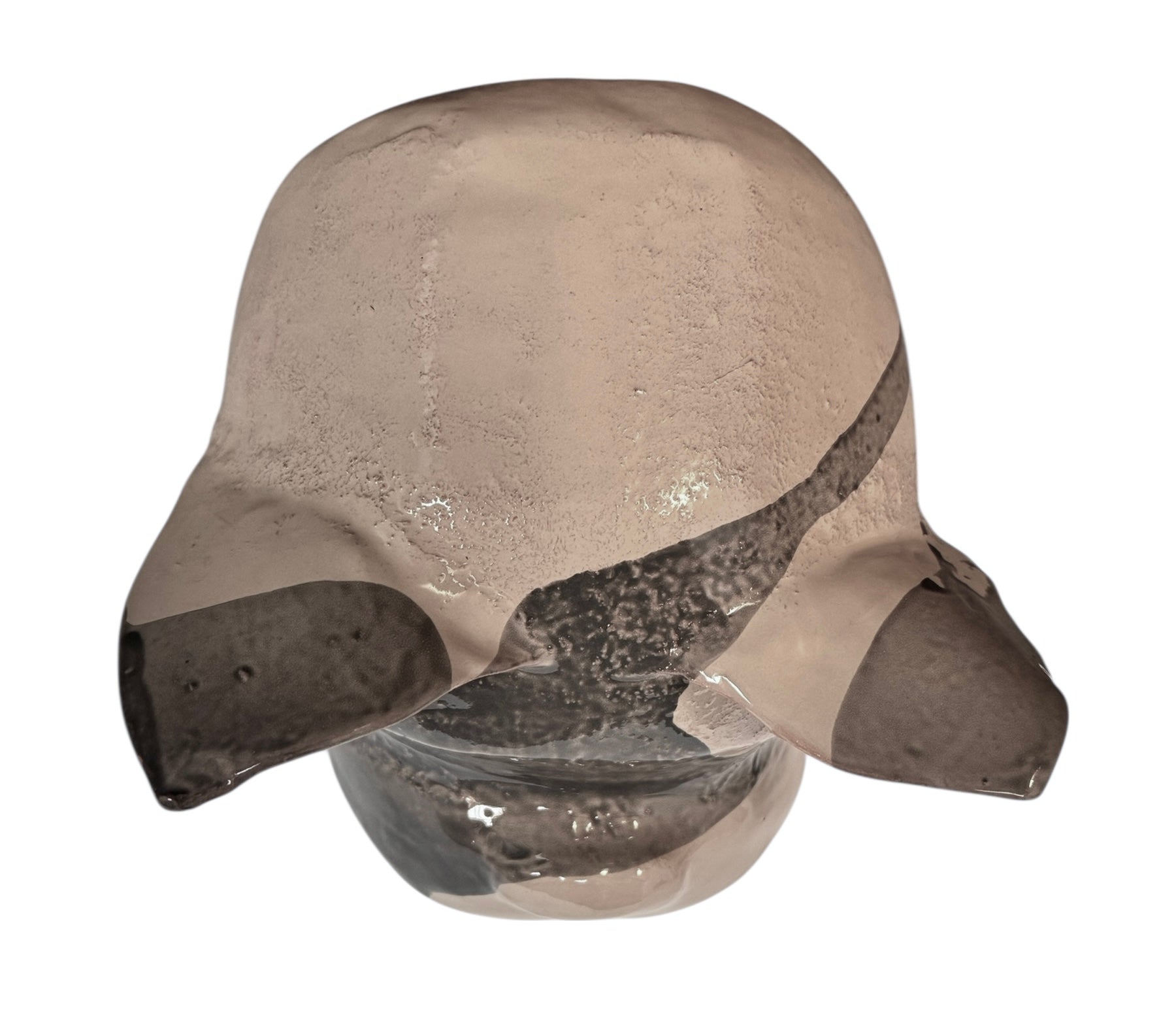 A ceramic sculpture of a bulldog's head by Enza Fasano. The piece features a glossy, glazed finish with a sophisticated color palette of muted greys, creams, and earthy brown tones arranged in bold, abstract striped patterns across the face and ears. The bulldog has characteristic folded ears, a prominent snout, and a soulful, slightly downturned expression. The sculpture is set against a clean, white background, highlighting its smooth texture and reflective surface.