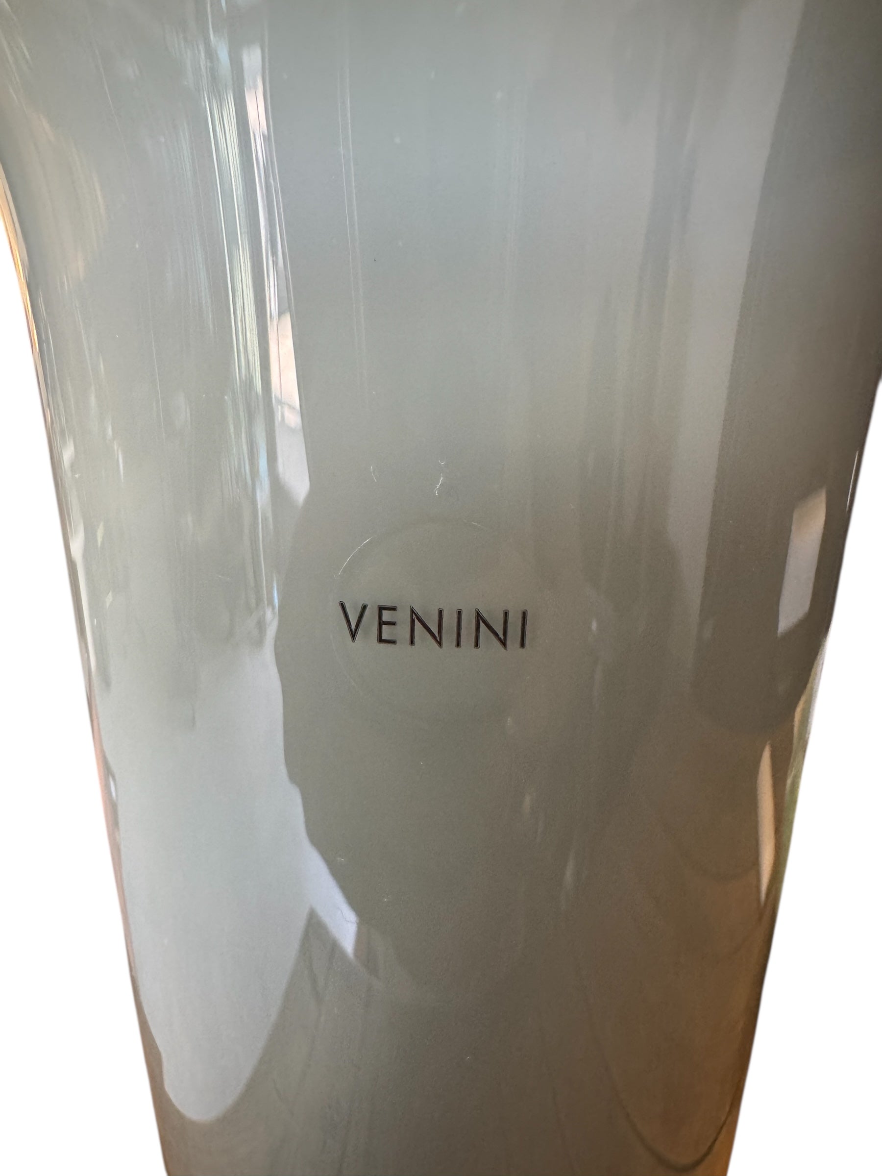 Image of a Venini Anni Trenta art glass vase, featuring a flared silhouette, Talpa colored exterior, and Acquamare interior, created using the Opalino technique