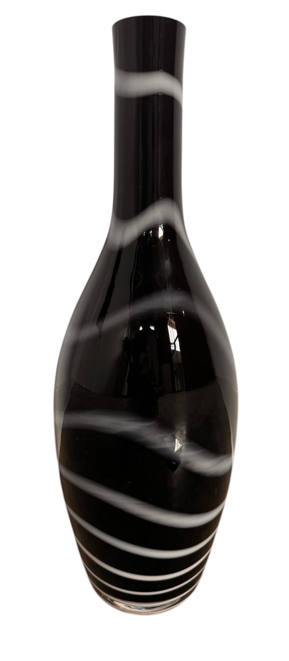 A sleek, hand-blown Polish art glass vase featuring a tall, slender neck that flares into a rounded, bulbous body. The vase is made of opaque black glass decorated with a continuous white spiral ribbon that winds around the entire piece from base to rim. The high-gloss, reflective surface creates sharp highlights, emphasizing its smooth, sculptural silhouette against a plain white background.