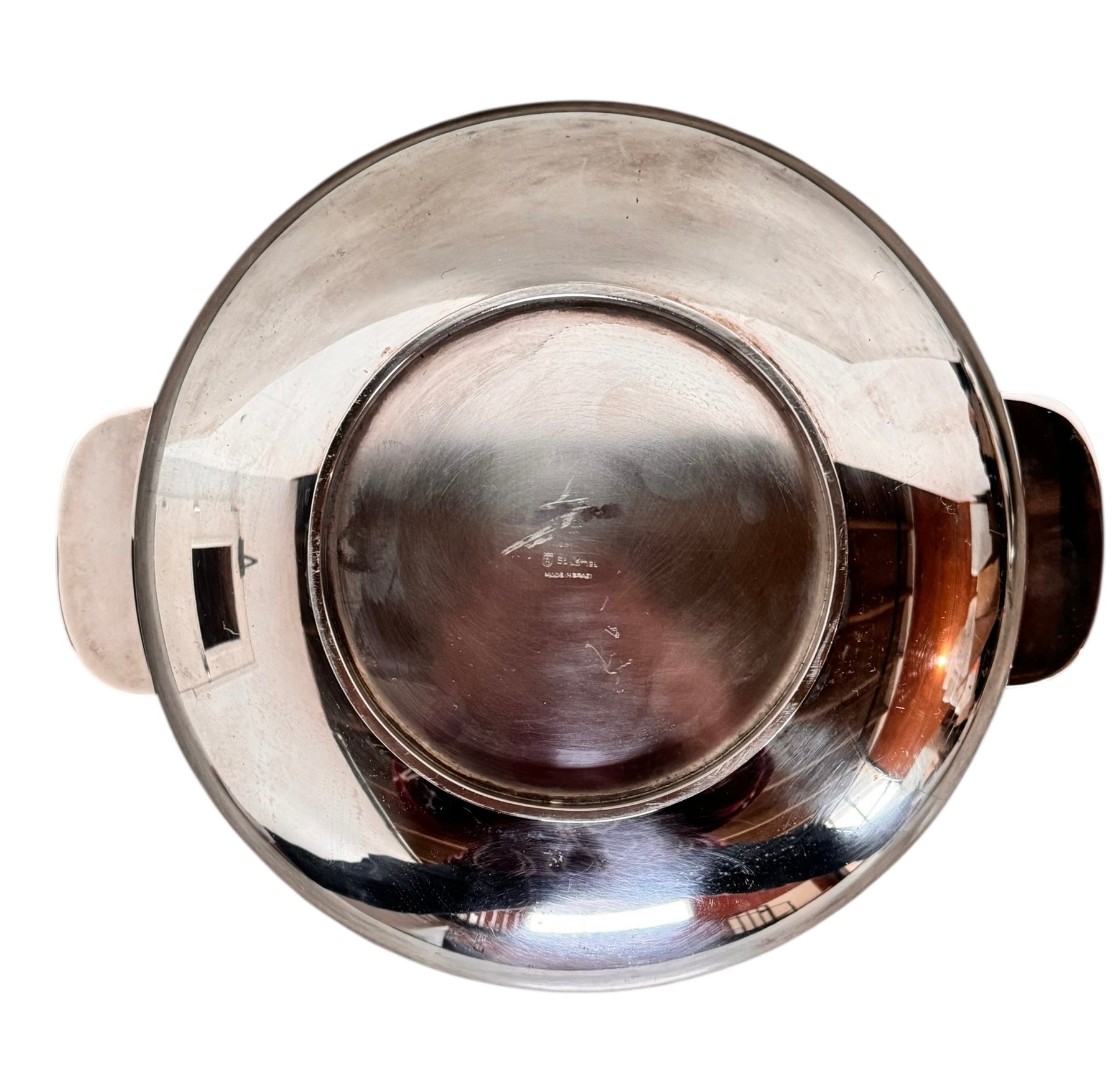 Round St. James silver-plated lidded serving dish from the 1980s, featuring a minimalist modernist design with geometric side handles and a sculptural, biomorphic finial, showing visible vintage wear and pitting on the metallic surface.