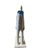 Ceramic horse by Domenico Pinto, featuring a white glazed body, geometric quilting on the saddle, a decorative crown with white and gold accents, and 24Kt gold detailing. The horse stands on four legs and is placed on a white base.