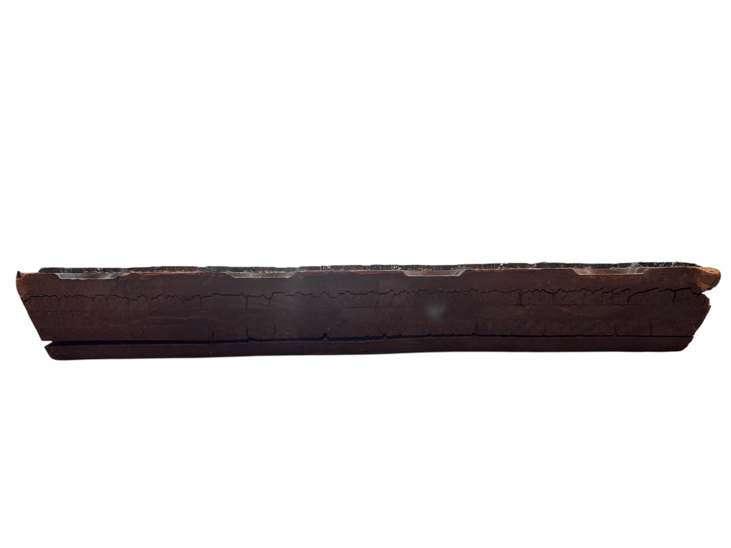 A vintage carved wooden printing block with intricate, repeating patterns, engraved with an unknown artist's signature and stamped "Made in France." The wood shows signs of age and wear, adding to its historical character