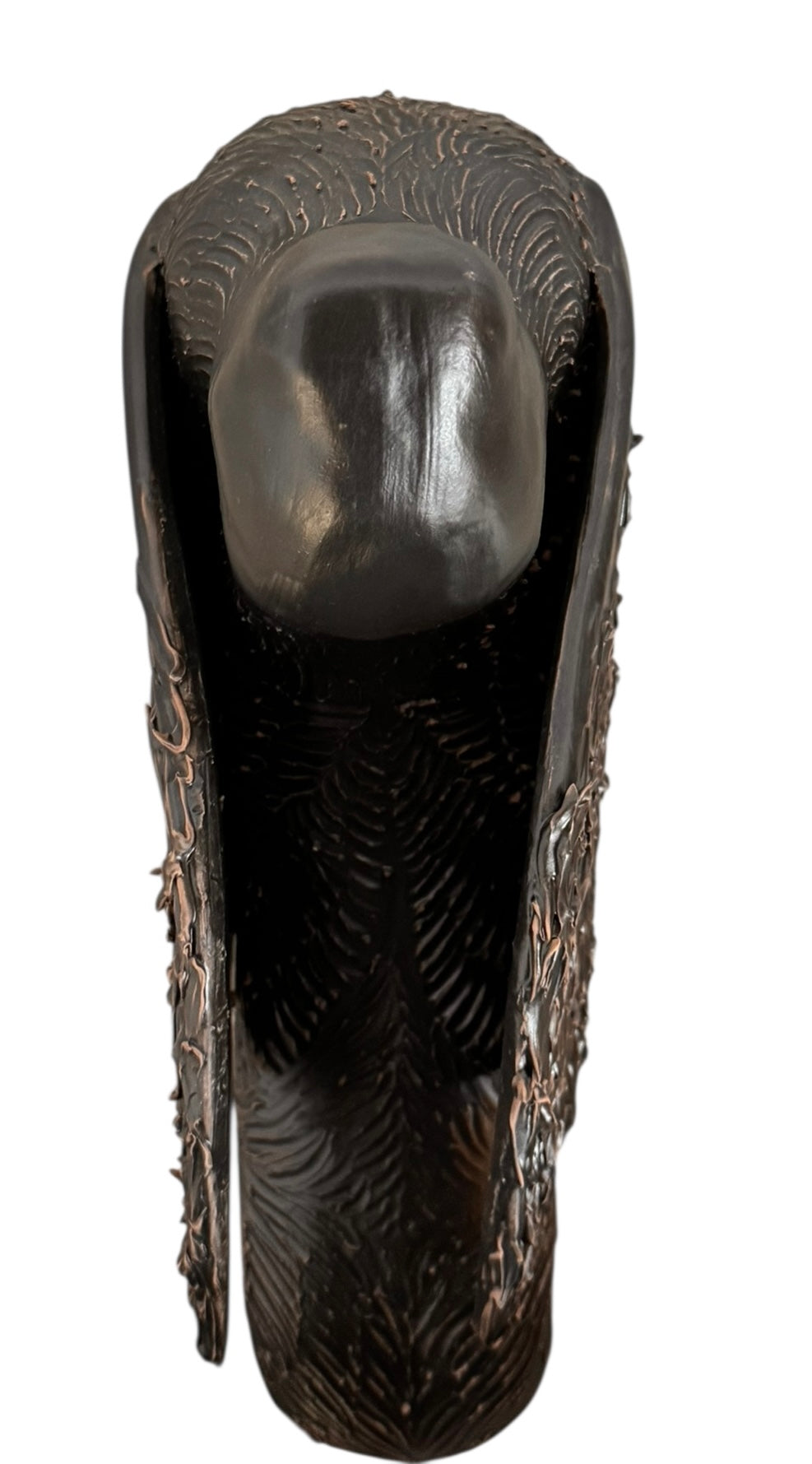 A dark, chocolate-brown ceramic sculpture by Enza Fasano depicting the stylized head of a hunting dog, such as a pointer or hound. The piece features a smooth, elongated snout and large, floppy ears with a textured, feathery finish that contrasts with the sleek crown of the head. The minimalist design emphasizes the dog's elegant profile and long neck.