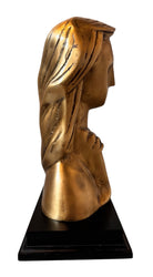 Cast bronze bust of a woman, mid-century Korean design, on a dark wood base. The figure has stylized flowing hair and no mouth.