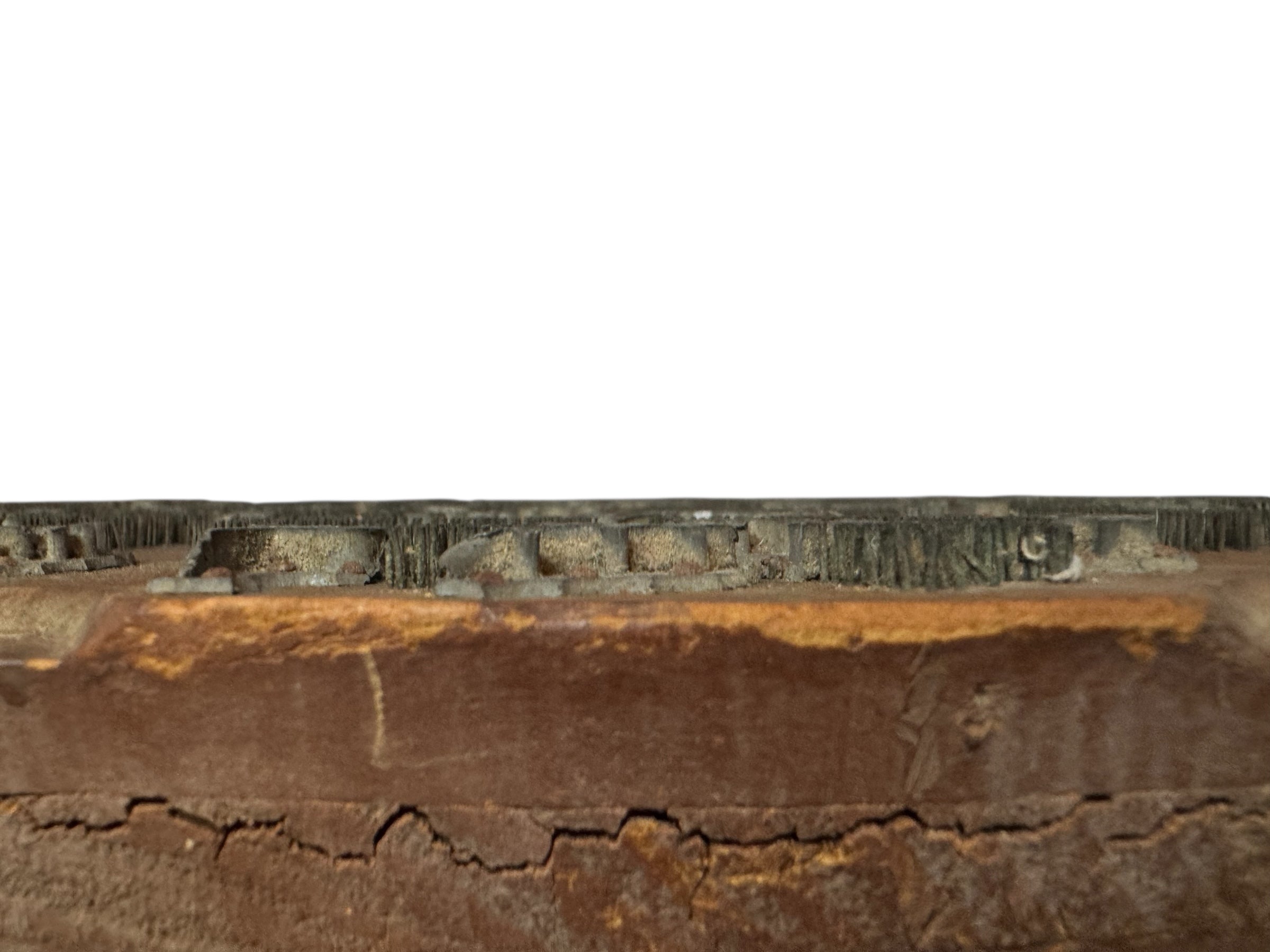 A vintage carved wooden printing block with intricate, repeating patterns, engraved with an unknown artist's signature and stamped "Made in France." The wood shows signs of age and wear, adding to its historical character