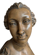 Terracotta bust of Madame de Pompadour, highlighting her elegant features and elaborate coiffure in the Rococo style of the French court.