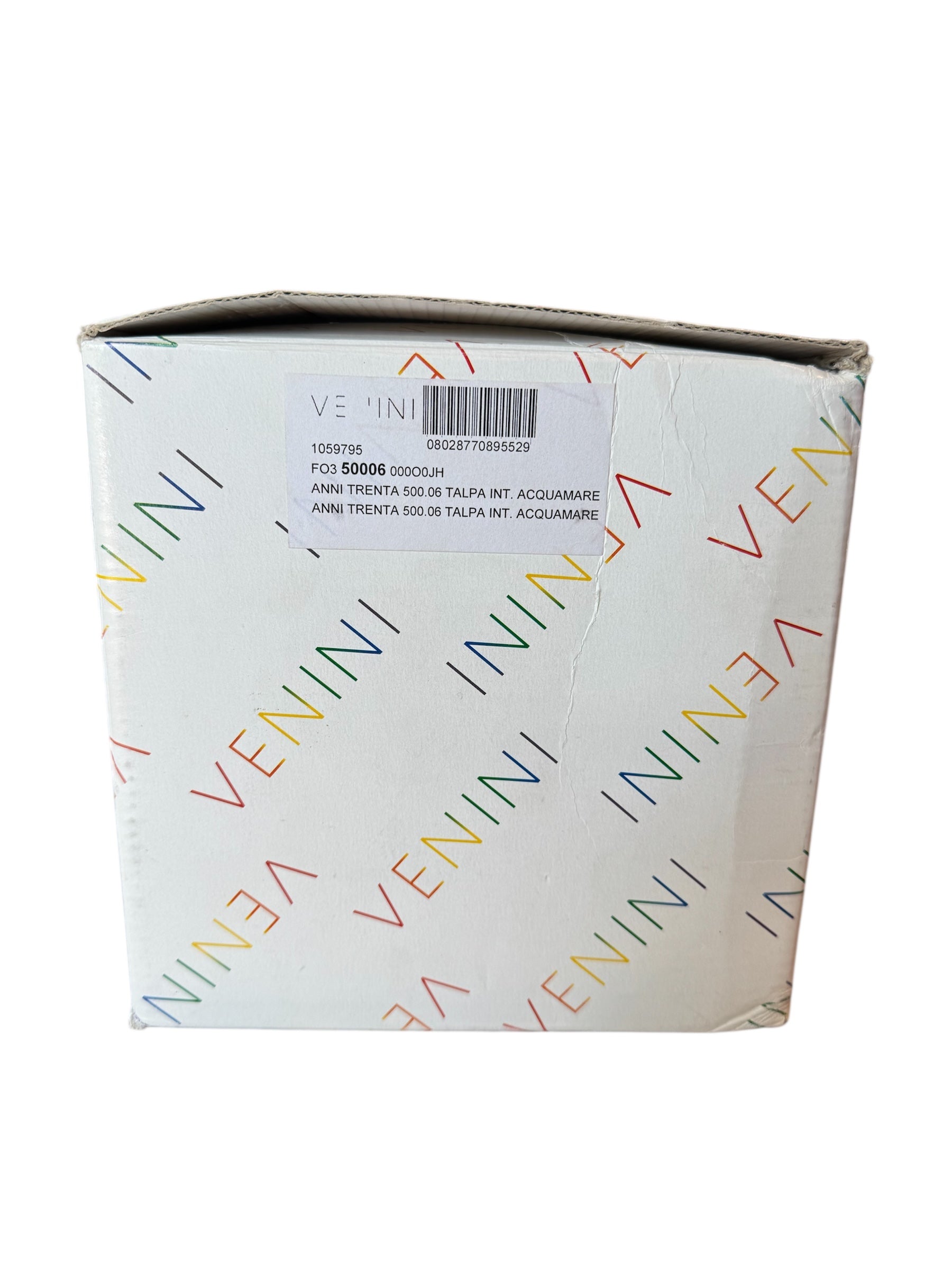 Image of a Venini Anni Trenta art glass vase, featuring a flared silhouette, Talpa colored exterior, and Acquamare interior, created using the Opalino technique