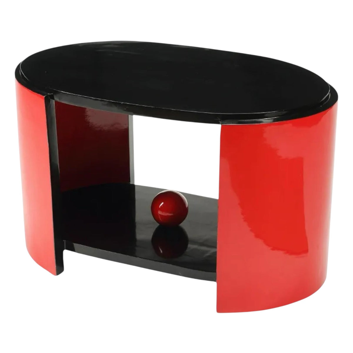 A lacquered sculptural coffee table with red and black colors, featuring a central red sphere on the lower shelf.