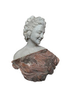 A 25-inch high polychrome marble bust of a woman, featuring white marble for her face and hair, with a base and draped fabric adorned with carved roses and leaves.
A Female Portrait in a Marble Bust