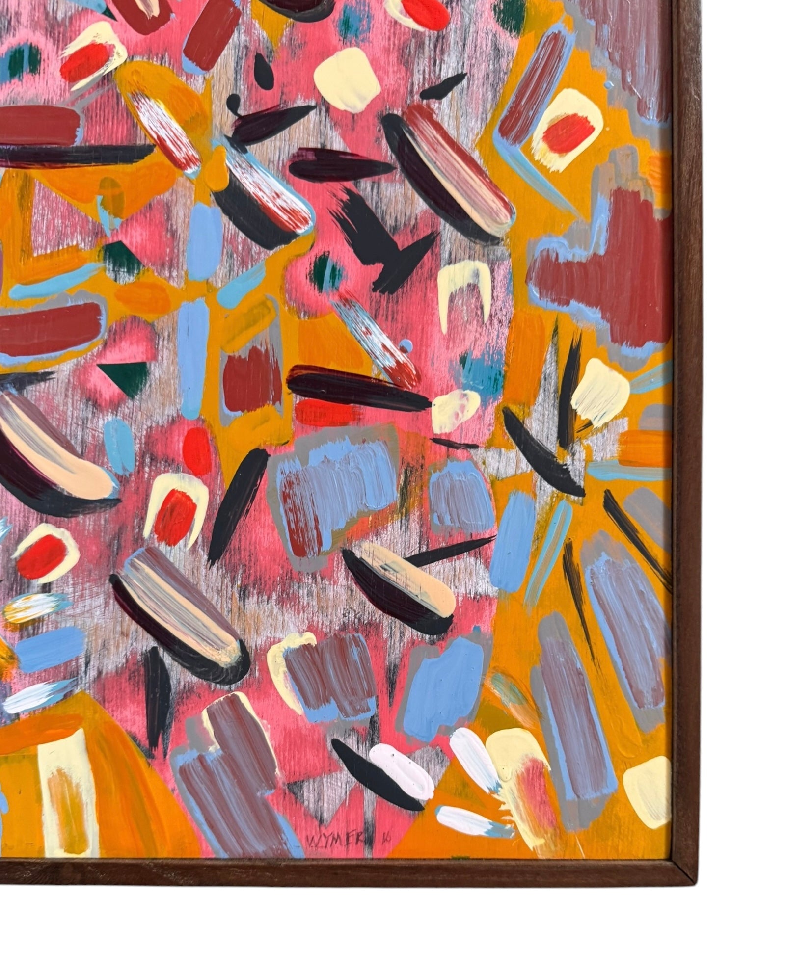 An abstract painting titled 'Cascade of Gold and Pink' by Robert Wymer, framed in dark wood. The artwork features a vibrant pink background densely covered with a dynamic arrangement of multi-directional, oblong, and dash-like brushstrokes in gold, red, blue, gray, white, and black.