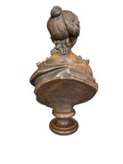 Terracotta bust of Madame de Pompadour, highlighting her elegant features and elaborate coiffure in the Rococo style of the French court.