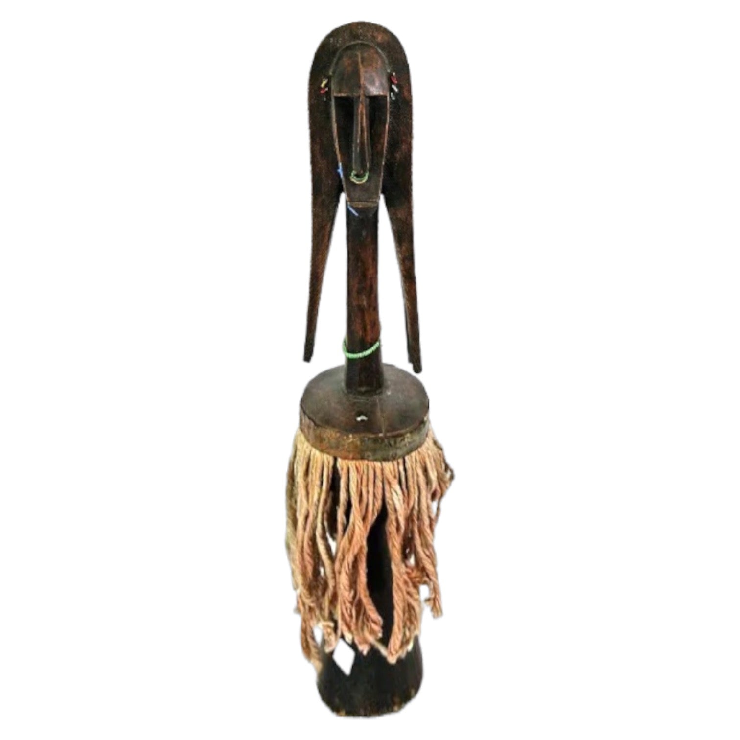 A wooden sculpture of a two-faced figure, with one face carved to show the eyes and nose, and the other face left plain. It has a sturdy base and a tassel-like hanging at the bottom.
Wisdom Sculpture - Carved Two Faced West African