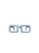 Cyan Style sculpted paperweight in the shape of spectacles. Modern design with intricate detailing, excellent condition.