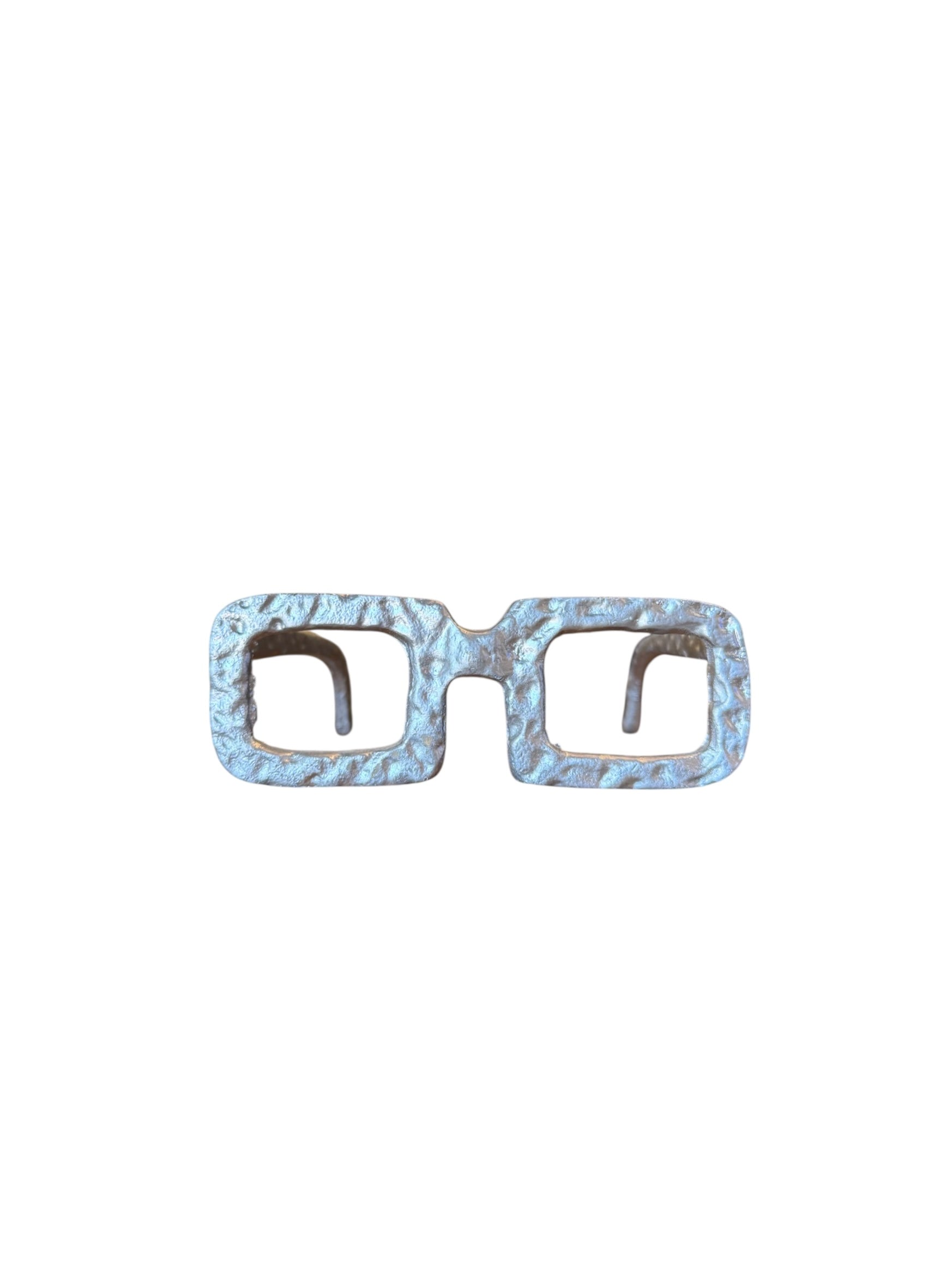 Cyan Style sculpted paperweight in the shape of spectacles. Modern design with intricate detailing, excellent condition.
