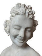 A 25-inch high polychrome marble bust of a woman, featuring white marble for her face and hair, with a base and draped fabric adorned with carved roses and leaves.