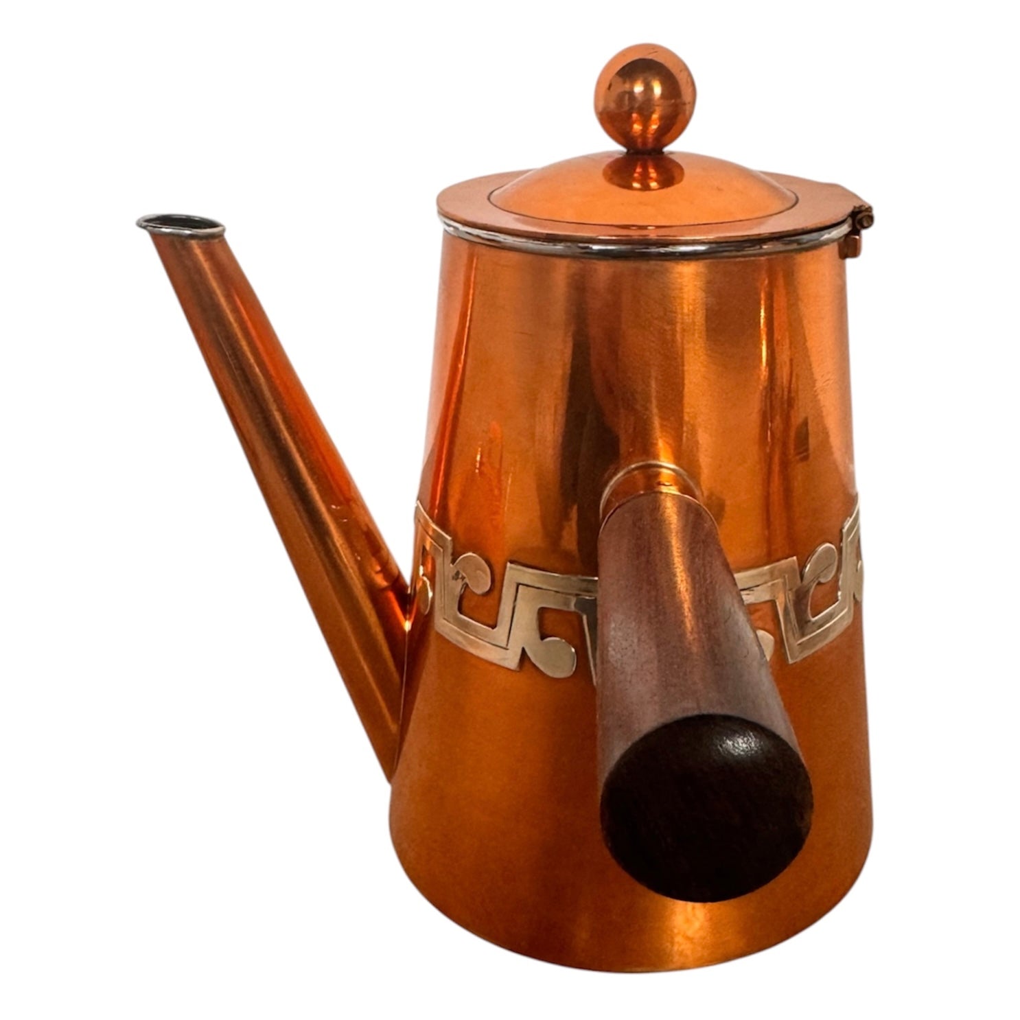 The set includes a large, rectangular, hammered copper tray with geometric openwork handles. Resting on the tray is a tall, slightly tapered copper coffee pot with a wooden handle, a matching smaller creamer pitcher with a similar wooden handle, a lidded sugar bowl, and a tiny matching metal cup or jigger. To the right off the tray sits a large, spherical copper water pitcher or jug with a wide mouth and ice lip.