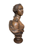 Terracotta bust of Madame de Pompadour, highlighting her elegant features and elaborate coiffure in the Rococo style of the French court.