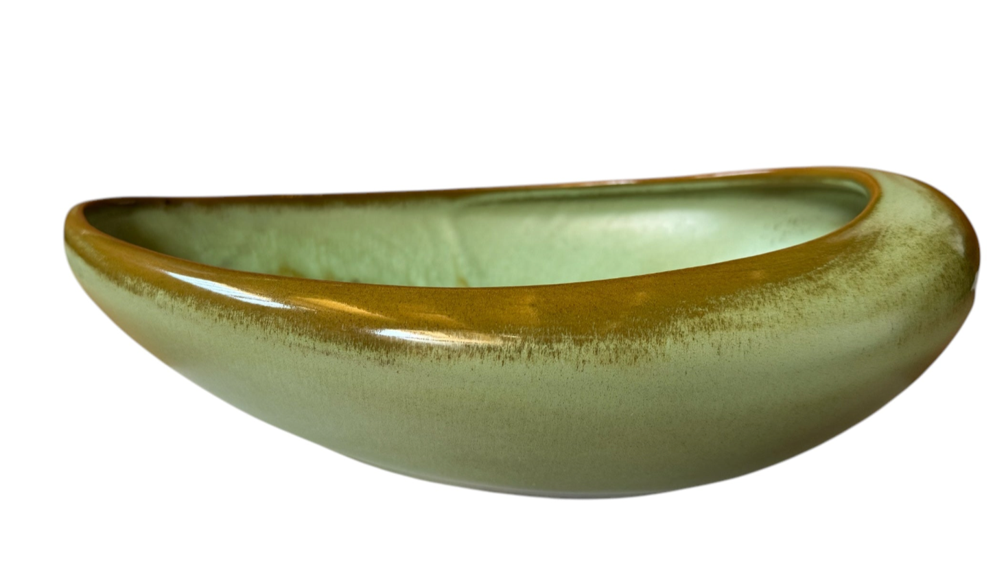 Organically shaped Frankoma ceramic bowl with a green and brown glaze.