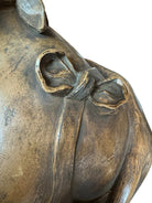 Terracotta bust of Madame de Pompadour, highlighting her elegant features and elaborate coiffure in the Rococo style of the French court.