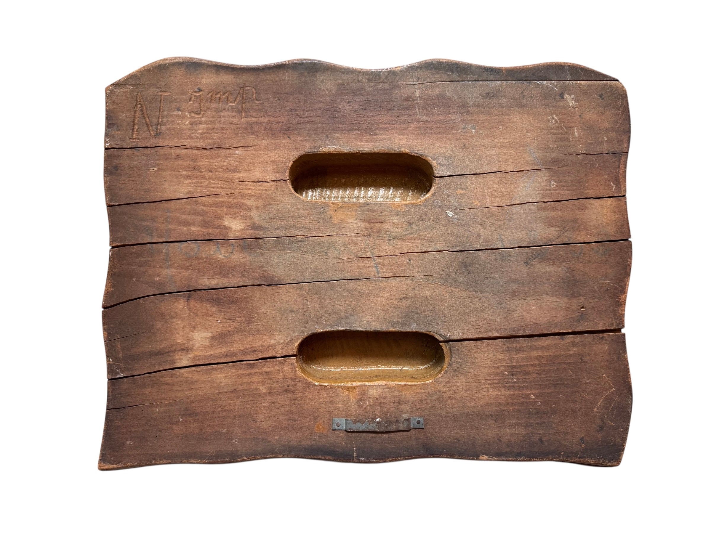 A vintage carved wooden printing block with intricate, repeating patterns, engraved with an unknown artist's signature and stamped "Made in France." The wood shows signs of age and wear, adding to its historical character