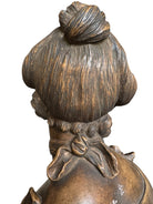 Terracotta bust of Madame de Pompadour, highlighting her elegant features and elaborate coiffure in the Rococo style of the French court.