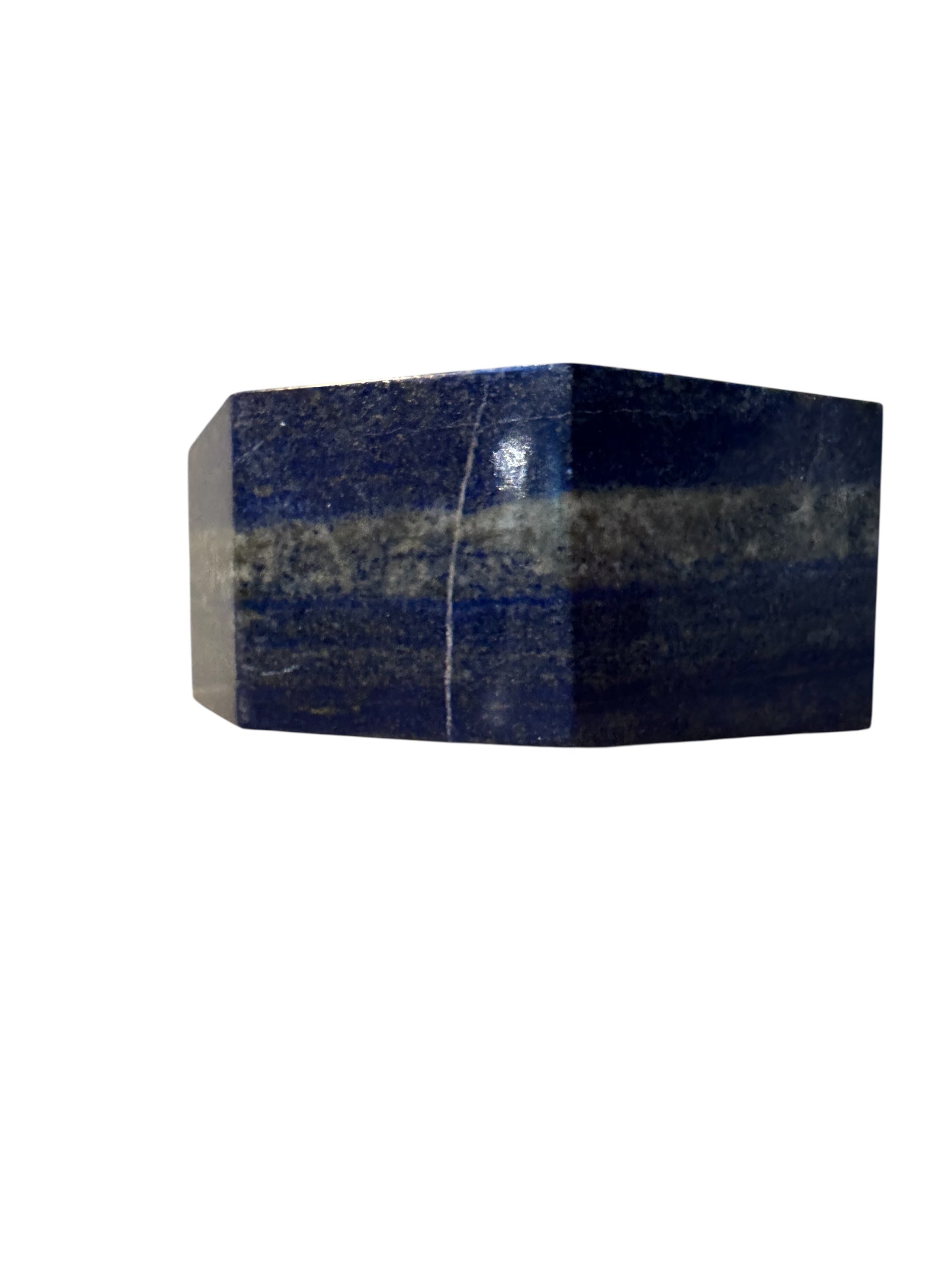 Hand-carved octagonal box made of lapis lazuli, featuring a red cabochon stone on its lid.