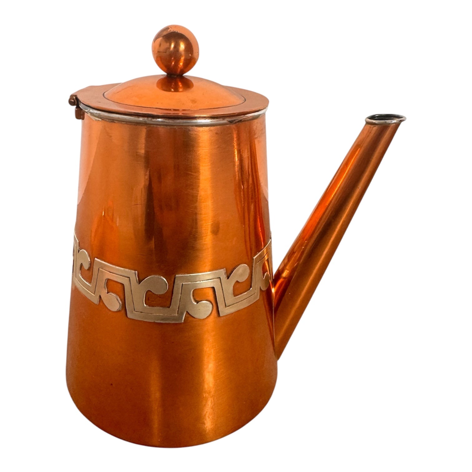 The set includes a large, rectangular, hammered copper tray with geometric openwork handles. Resting on the tray is a tall, slightly tapered copper coffee pot with a wooden handle, a matching smaller creamer pitcher with a similar wooden handle, a lidded sugar bowl, and a tiny matching metal cup or jigger. To the right off the tray sits a large, spherical copper water pitcher or jug with a wide mouth and ice lip.