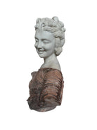 A 25-inch high polychrome marble bust of a woman, featuring white marble for her face and hair, with a base and draped fabric adorned with carved roses and leaves.