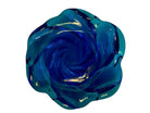 A hand-blown glass dish with a rich cobalt blue hue and organically shaped edges, reminiscent of a gentle wave.