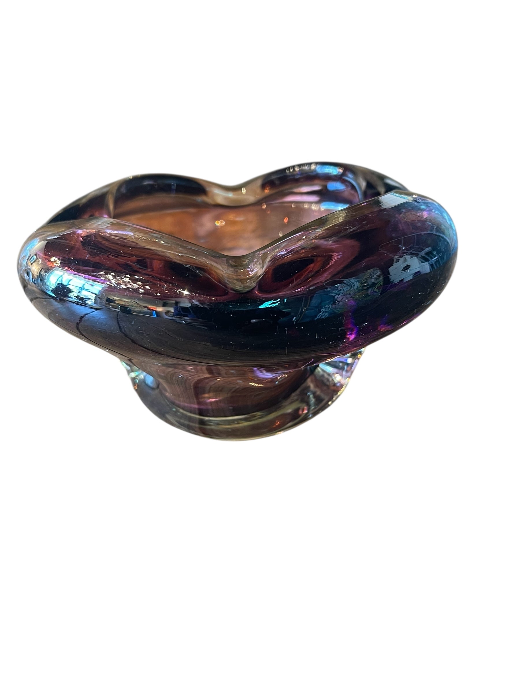 Amethyst Murano glass ashtray in a petal shape with indentions, a vintage design object.