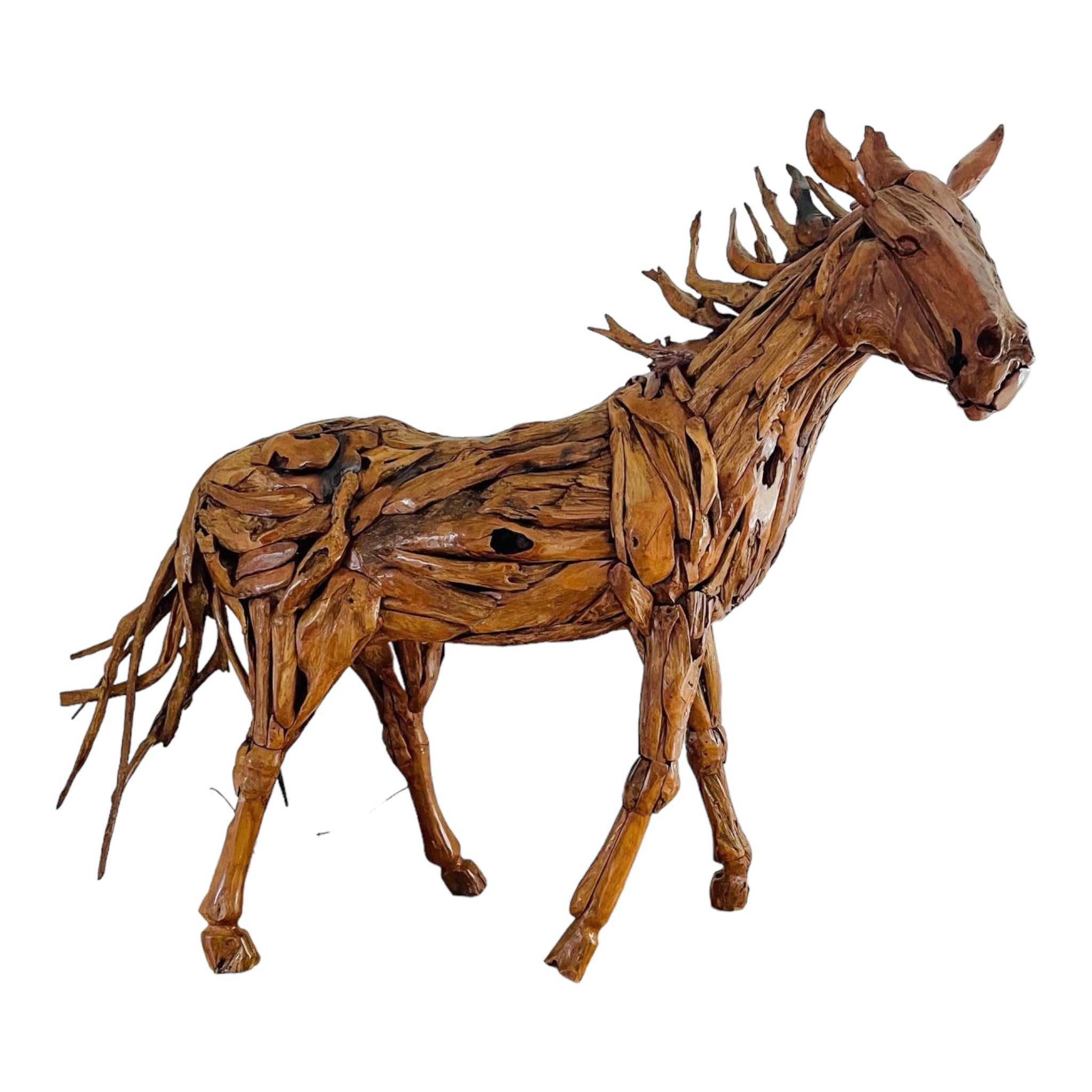 A life-sized equestrian sculpture made of wood, featuring a detailed horse face and a flowing mane and tail.