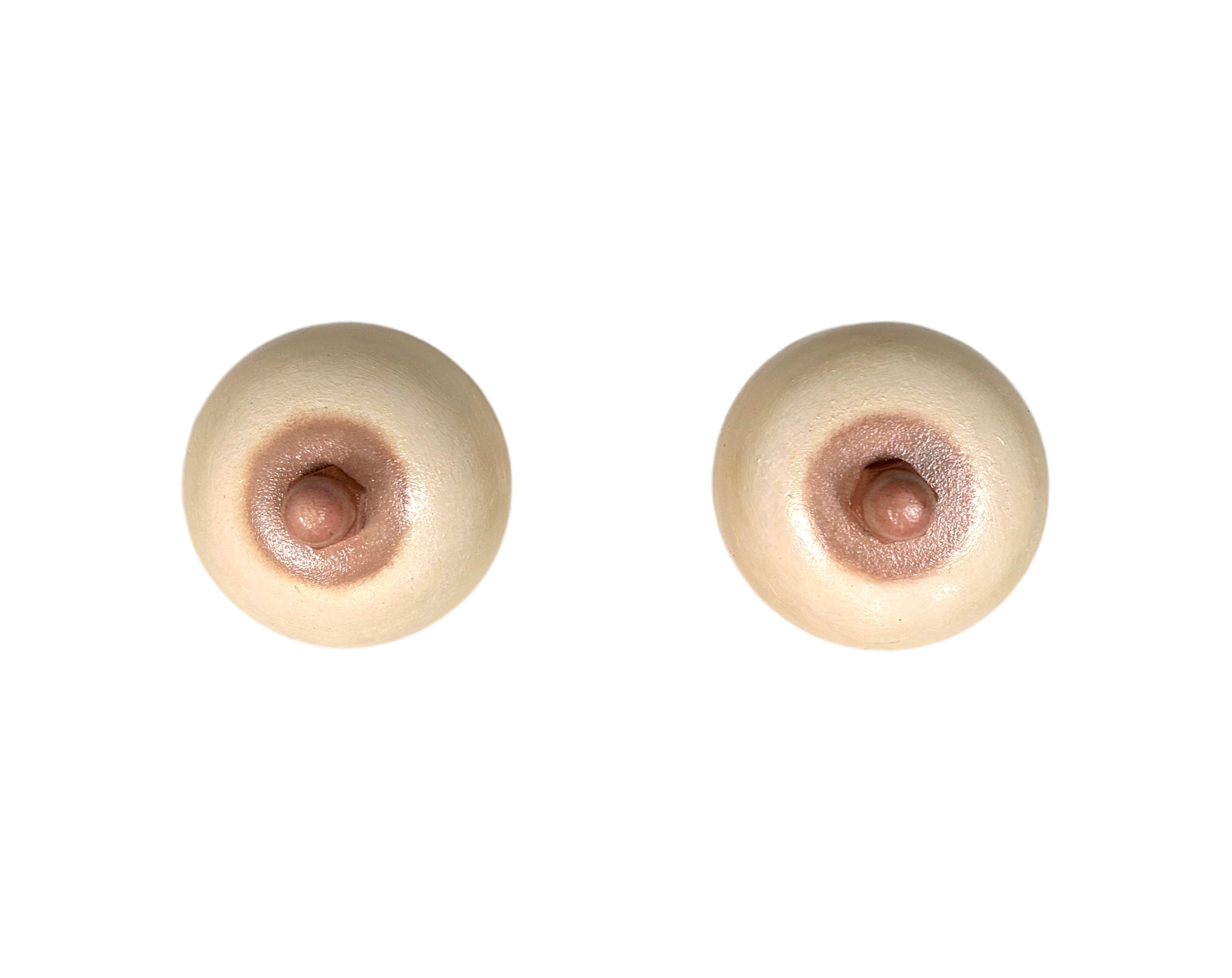 Two telephone bells painted beige with a realistic depiction of a human nipple in the center, by artist Ondrea Vicklund