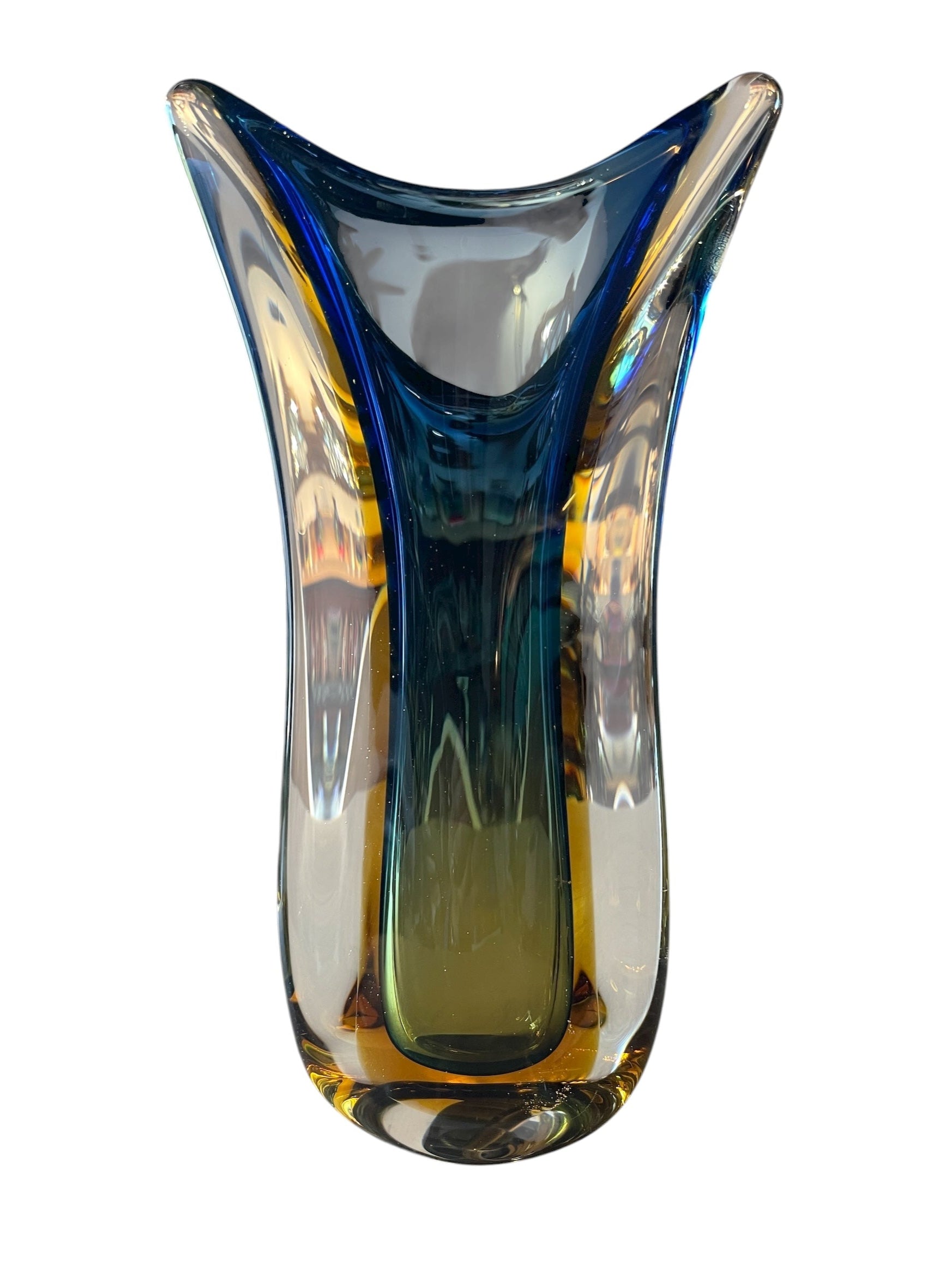 Sculptural art glass vase in the Sommerso style, featuring blue and amber colors encased in a clear glass layer. The vase has a vintage mid-century modern design