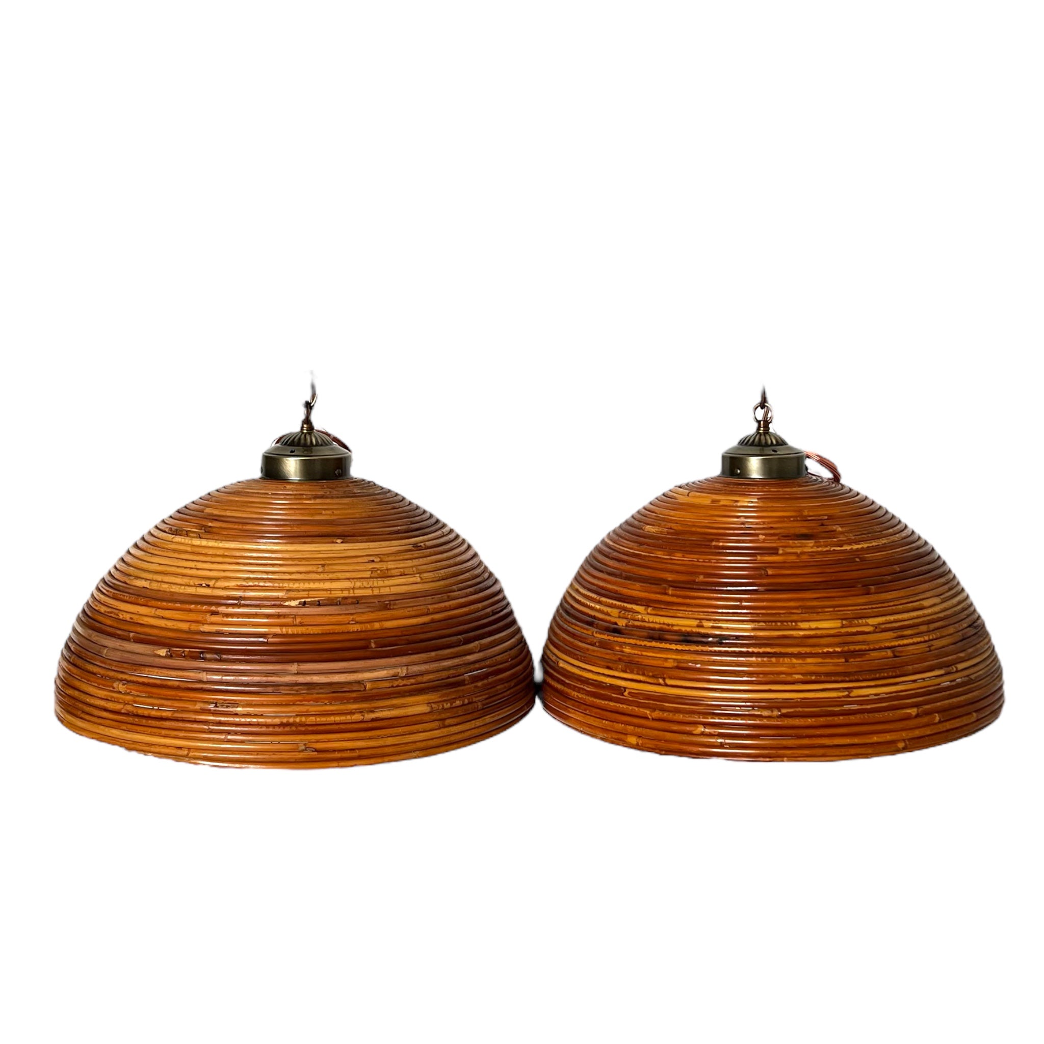 Dome-shaped 1960s rattan hanging chandeliers with brass hardware.