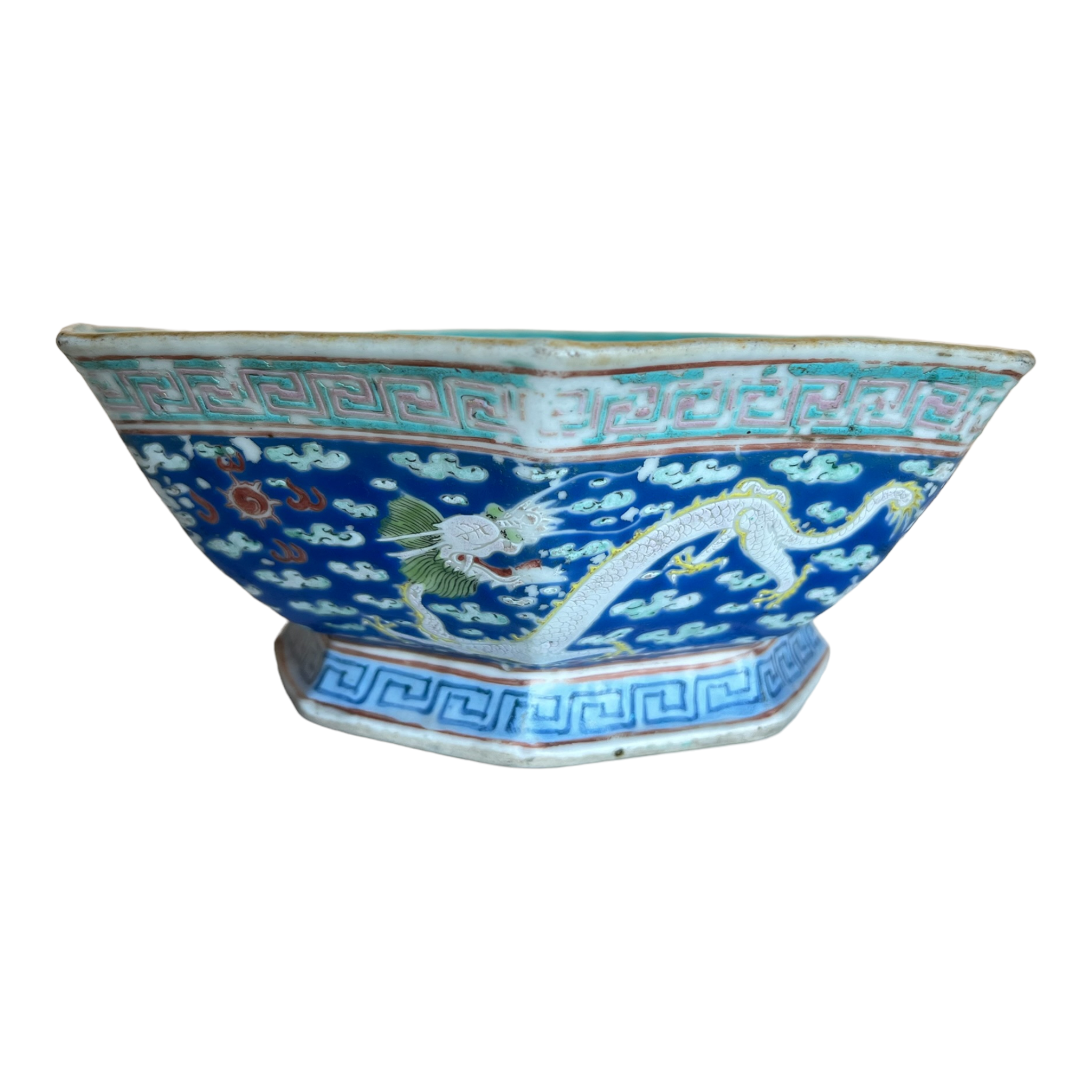 A 19th Century Antique Chinese Dragon and Phoenix Porcelain Bowl with blue and turquoise tones on a white background, featuring an octagonal shape and a red six character reign mark.