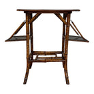 A 19th century tiger bamboo side table with two small side trays, featuring a brown japanning lacquer finish and metal hardware.