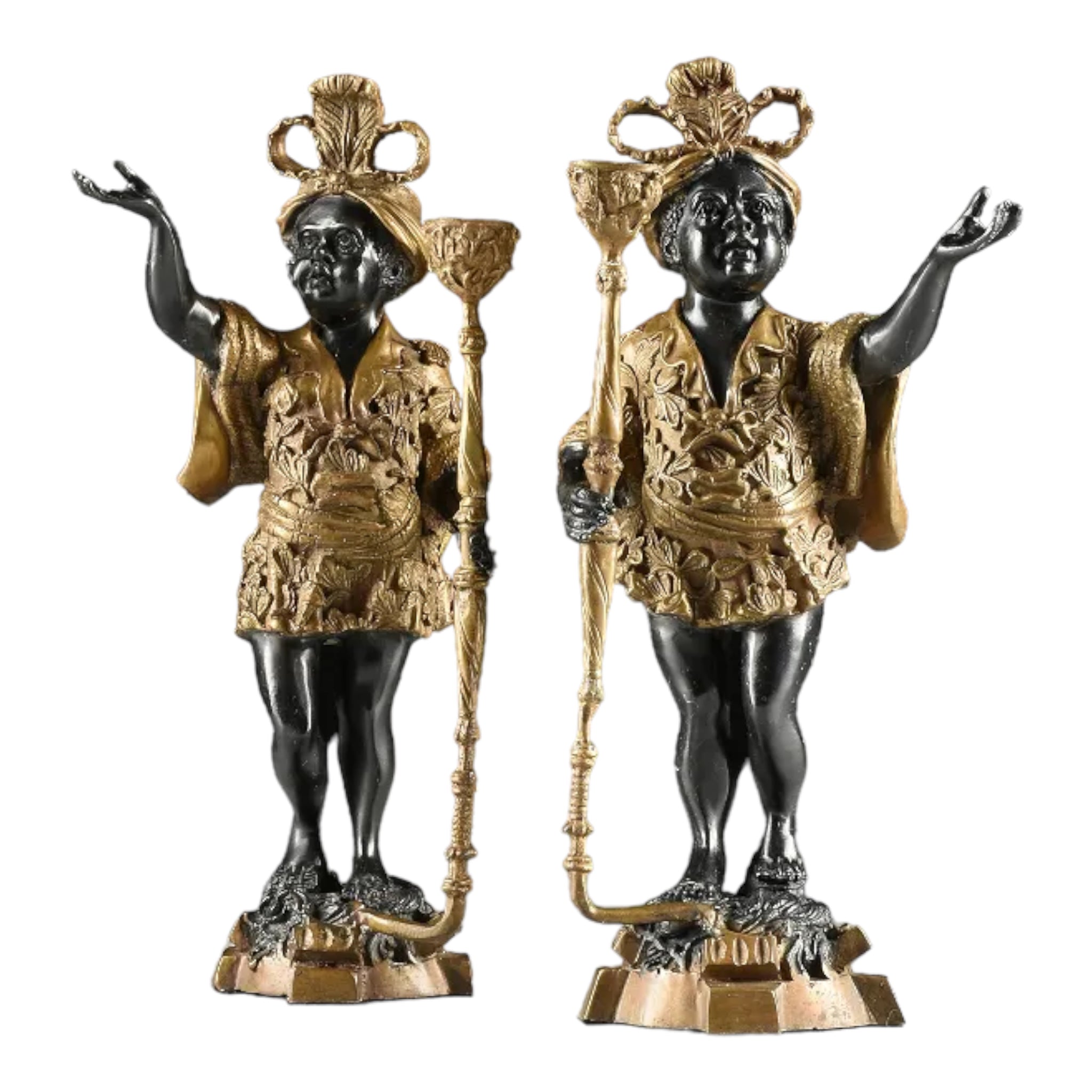 A pair of Moorish painted bronze candelabras with plumed headdresses, standing in contraposto pose. 19th Century.