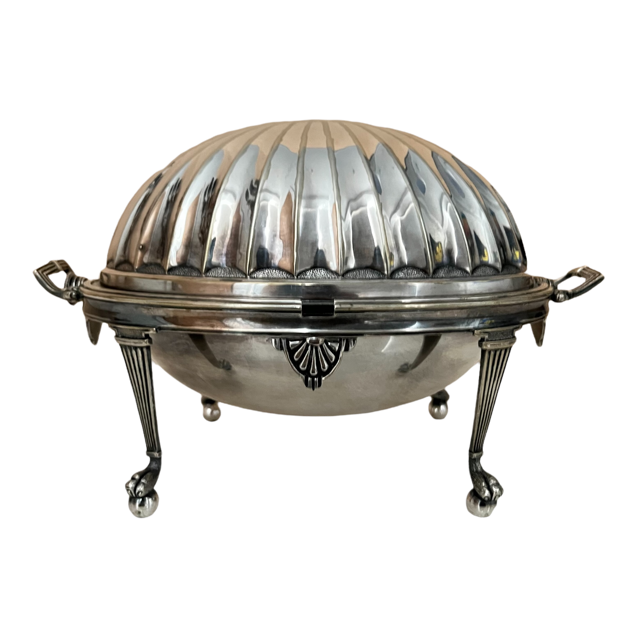 A silver plate serving dish with a lid, featuring a decorative pictorial mark, on paw-and-ball feet.
English Biscuit Service